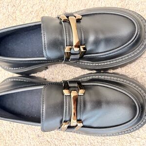 Black Loafers with Gold Accent